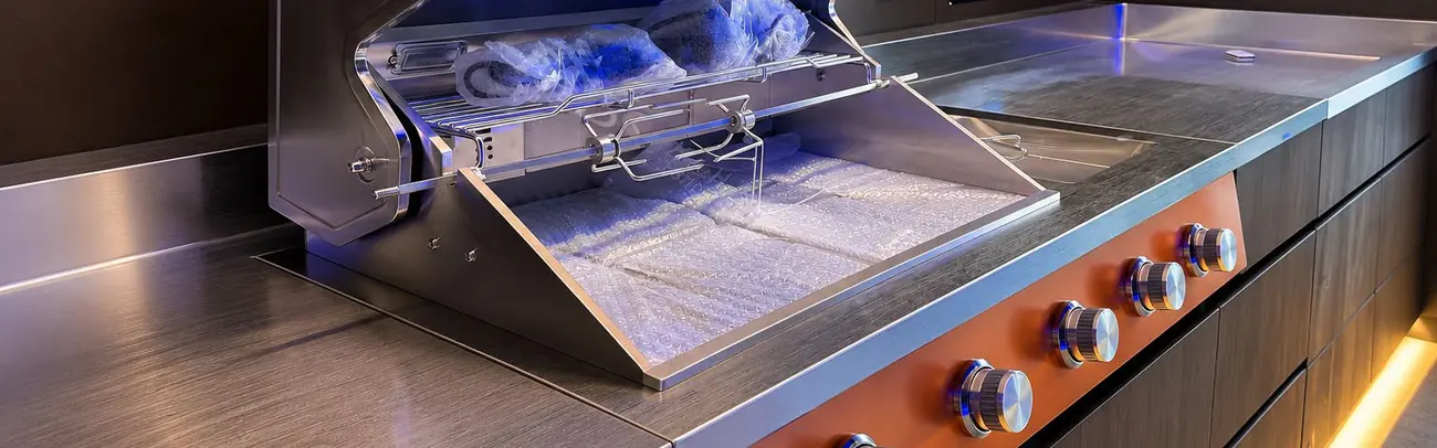 Barbecue Nox ouvert, rôtissoire et plan de travail inox